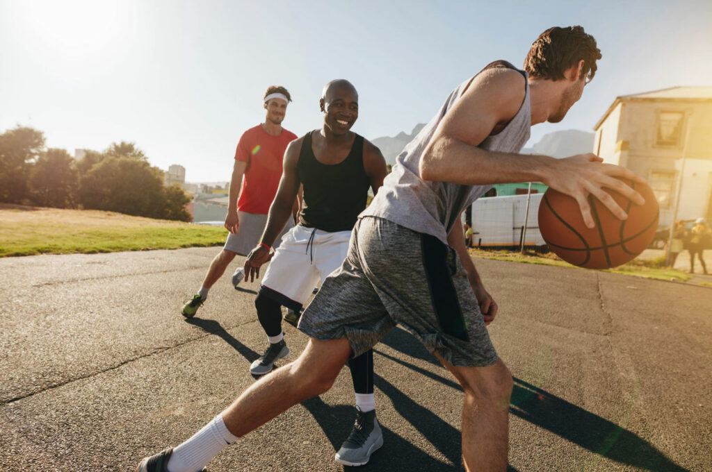 Four-men-playing-basketball