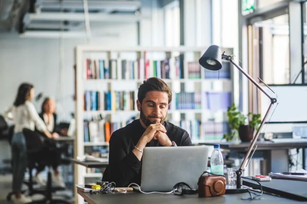 Man sitting at work desk