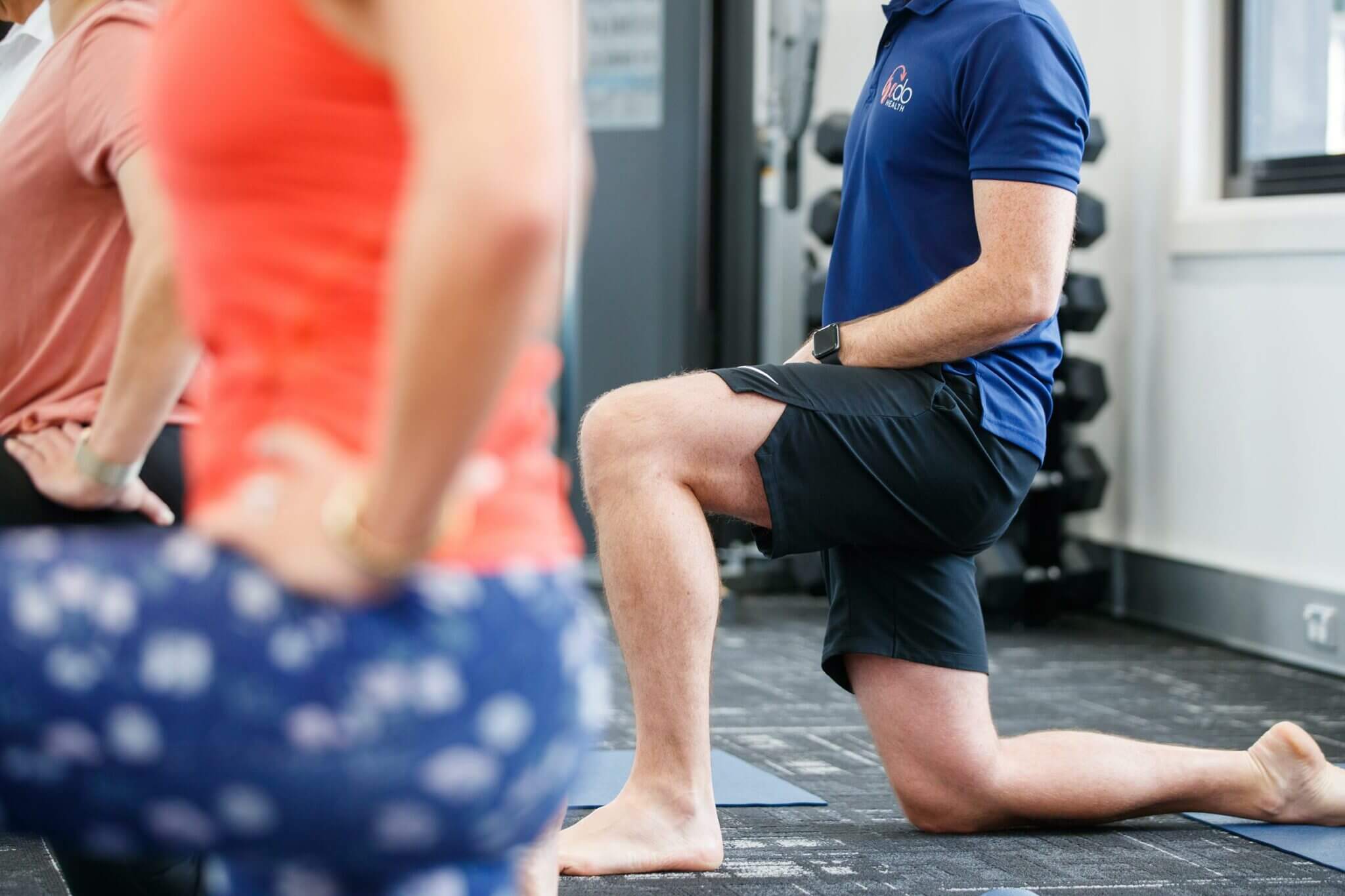 Physiotherapy 5 Brendan McGovern demonstrating a lunge during a rehabilitation session in the RedoHealth gym