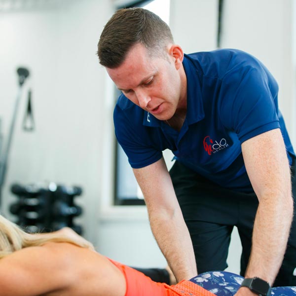 RedoHealth physiotherapist performing hands-on treatment on a patient at the Balmain clinic